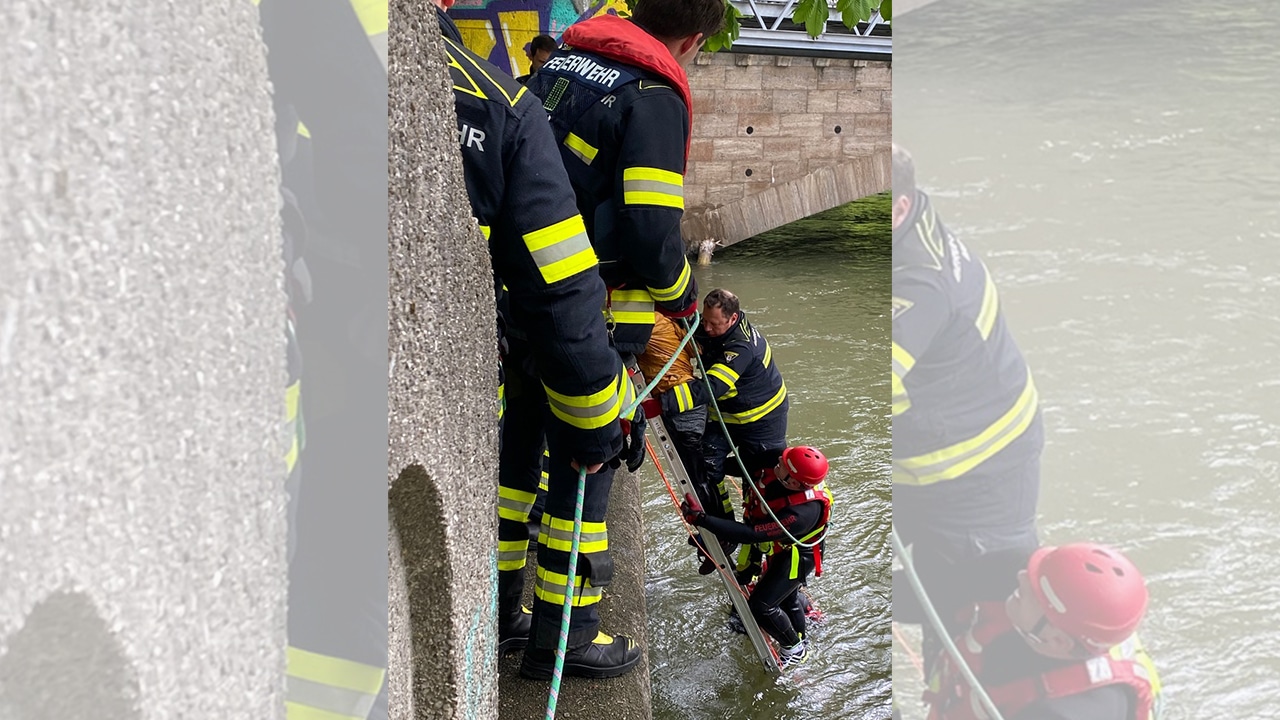 Bauarbeiter haben eine Frau in der Isar bemerkt